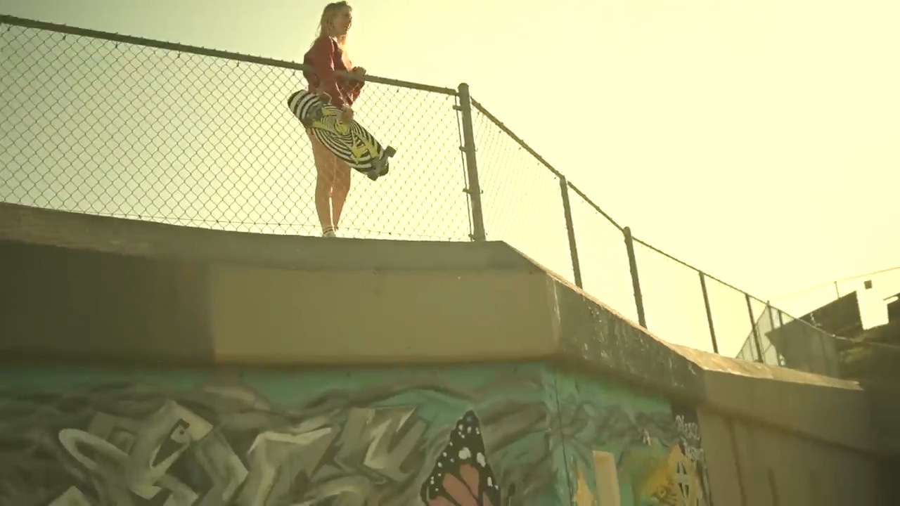 A skateboarder against a sunlit sky in Good Times (Roll On)